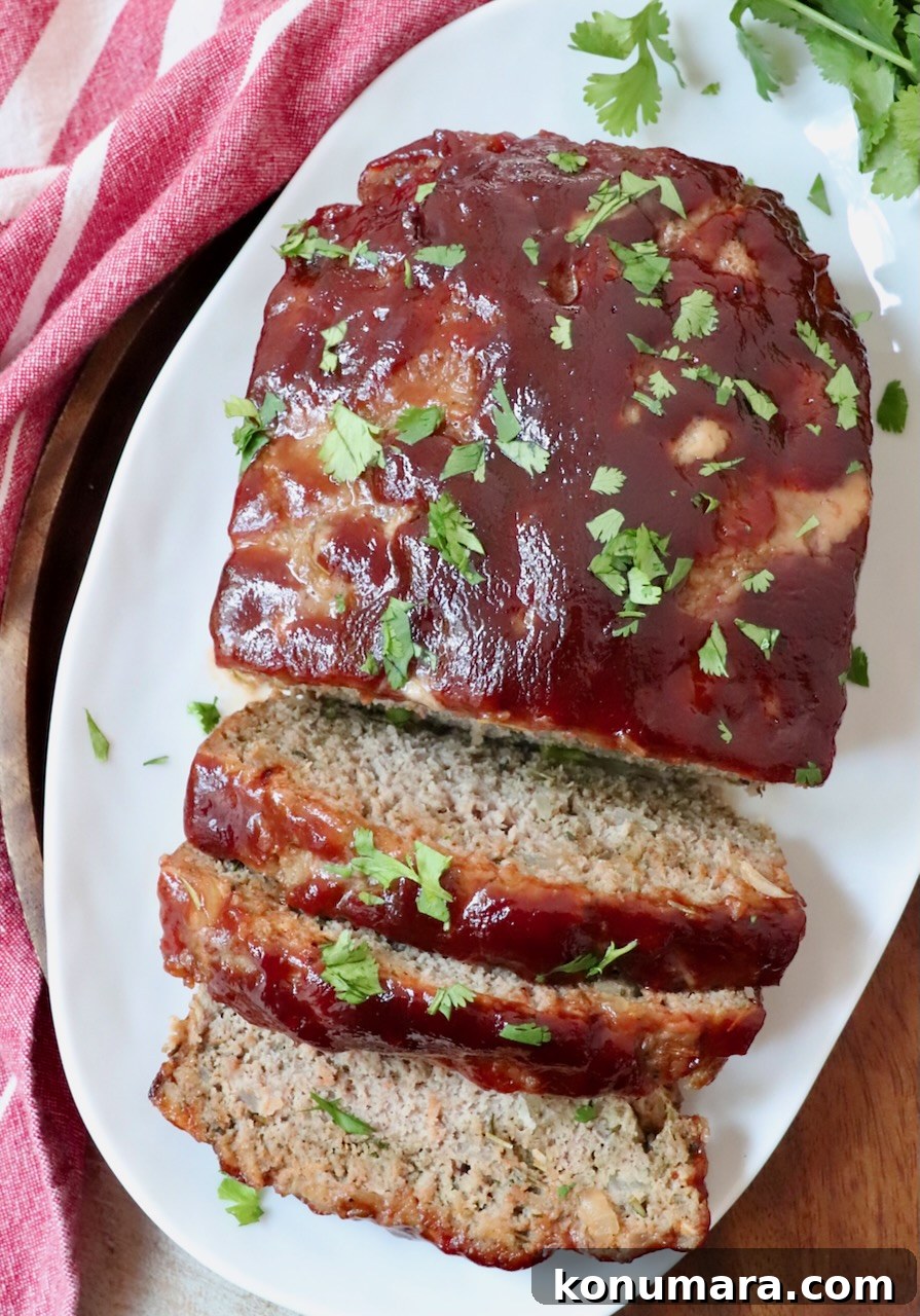 turkey meatloaf sliced on a white plate