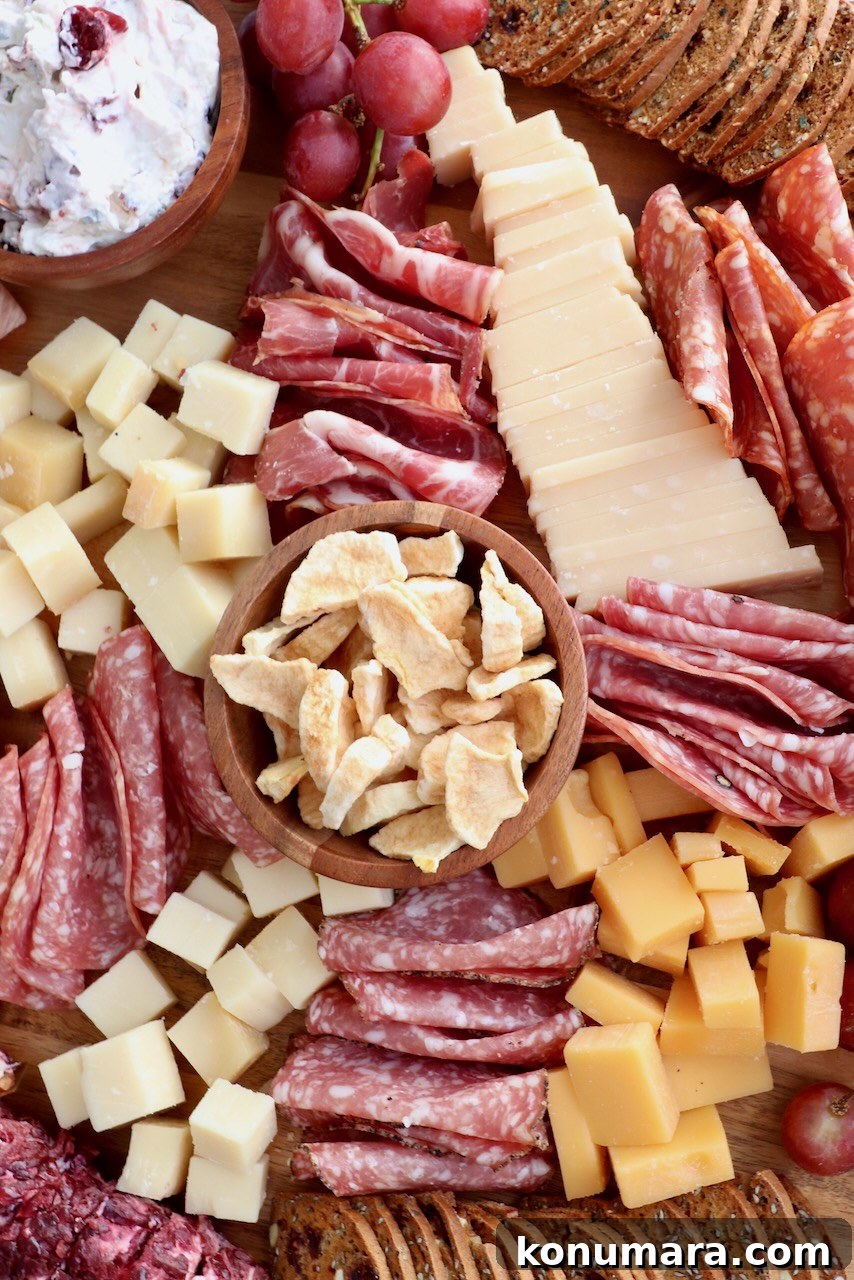 Cozy Fall Charcuterie Board with Seasonal Fruits and Cheese 5 fall charcuterie board with meats cheeses and crackers