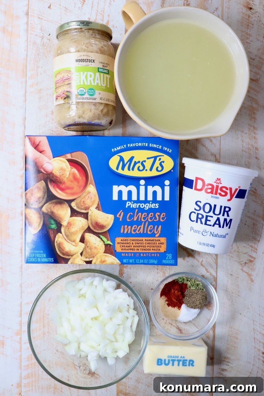 ingredients for pierogi soup on a white wood board