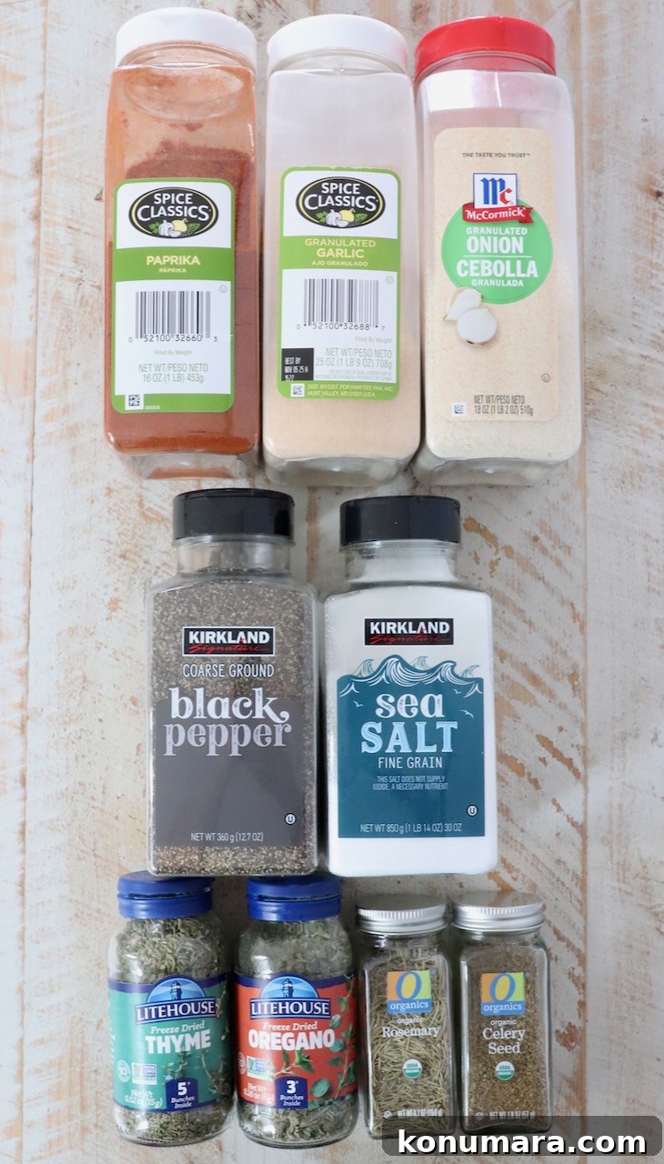 Homemade Beef Stew Seasoning for Rich Savory Flavor 3 dried herbs and spices in containers on a white wood board