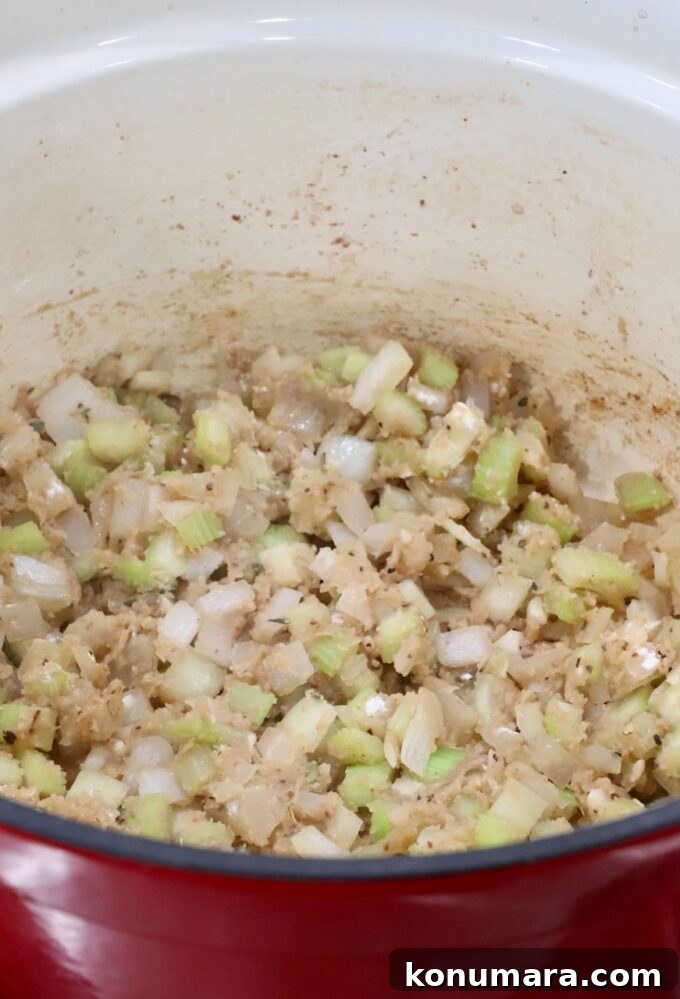 Comforting Slow-Cooked Beef Stew Recipe 7 diced onions and celery in a dutch oven with flour and broth