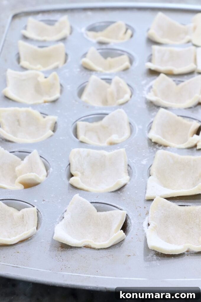 Crispy Puff Pastry Pickle Bites Recipe 4 puff pastry dough in a mini muffin tin
