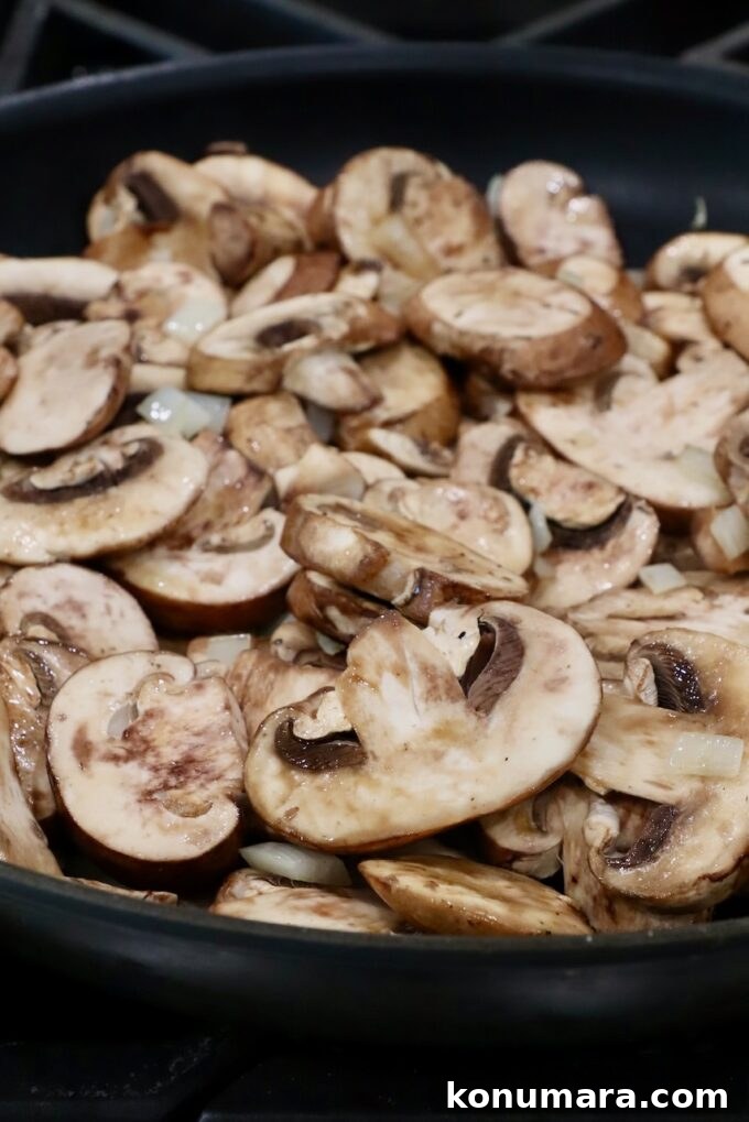 sliced mushrooms in a large skillet