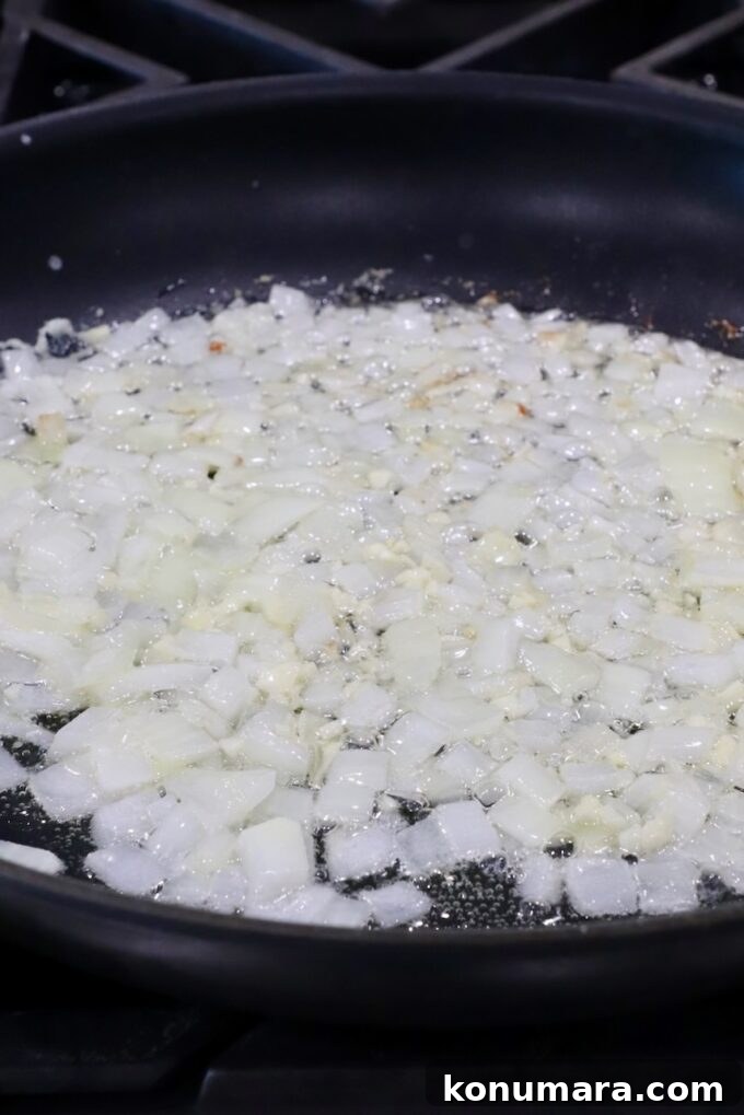 Creamy Au Gratin Potatoes Recipe 4 diced onions and garlic in a skillet