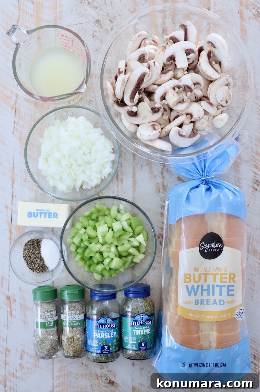 Mushroom Stuffing Recipe with Garlic and Herbs 3 ingredients for mushroom stuffing on a white wood board