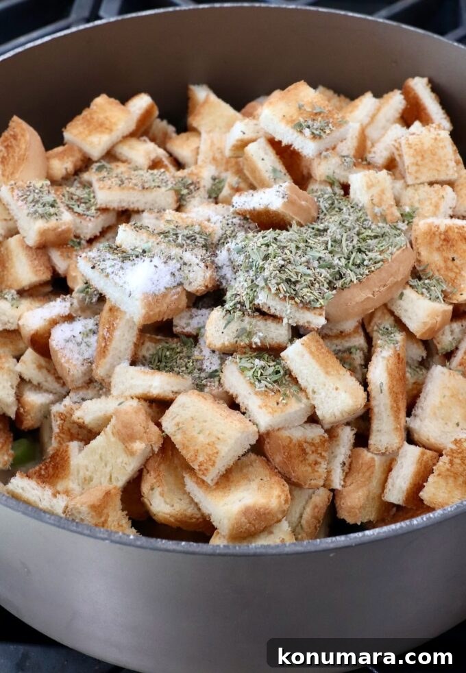 Mushroom Stuffing Recipe with Garlic and Herbs 7 bread cubes in a large pot seasoned with spices and dried herbs