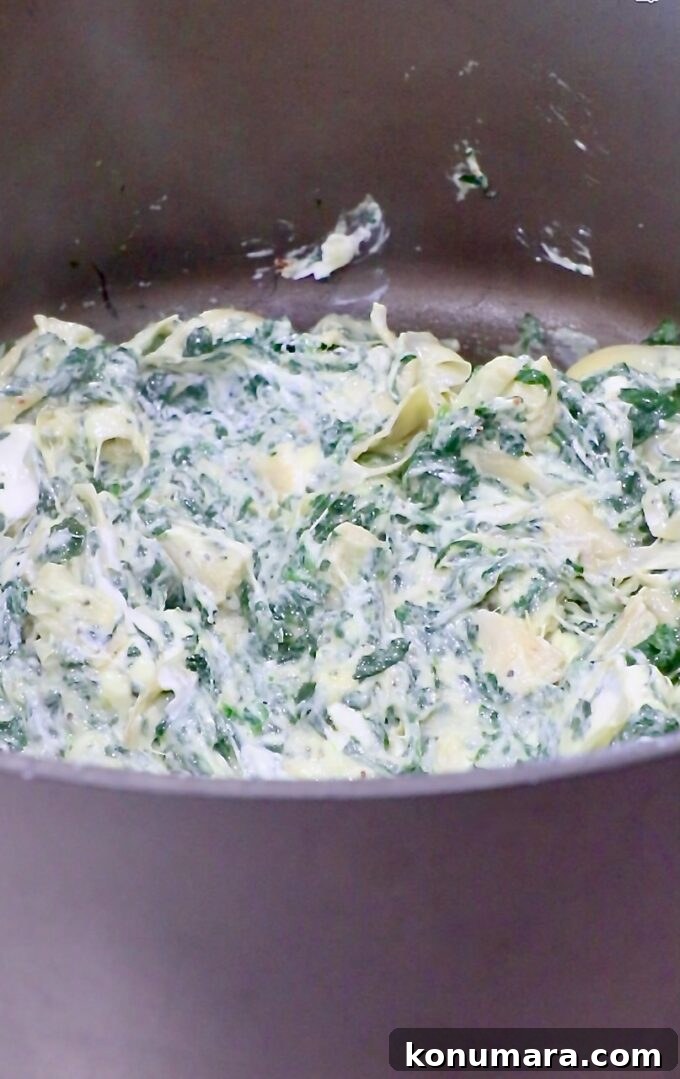 Creamy Baked Spinach and Artichoke Dip Recipe 6 spinach artichoke dip in a large pot