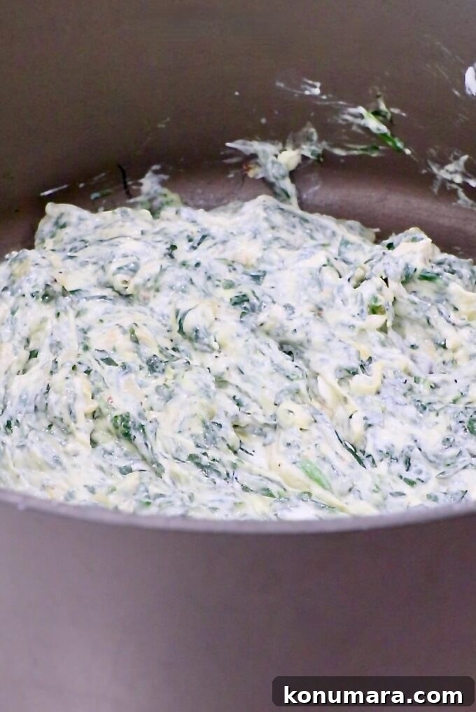 Creamy Baked Spinach and Artichoke Dip Recipe 7 creamy spinach artichoke dip in a large pot