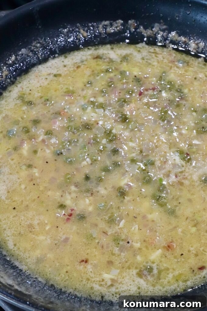 lemon sauce with capers in a skillet