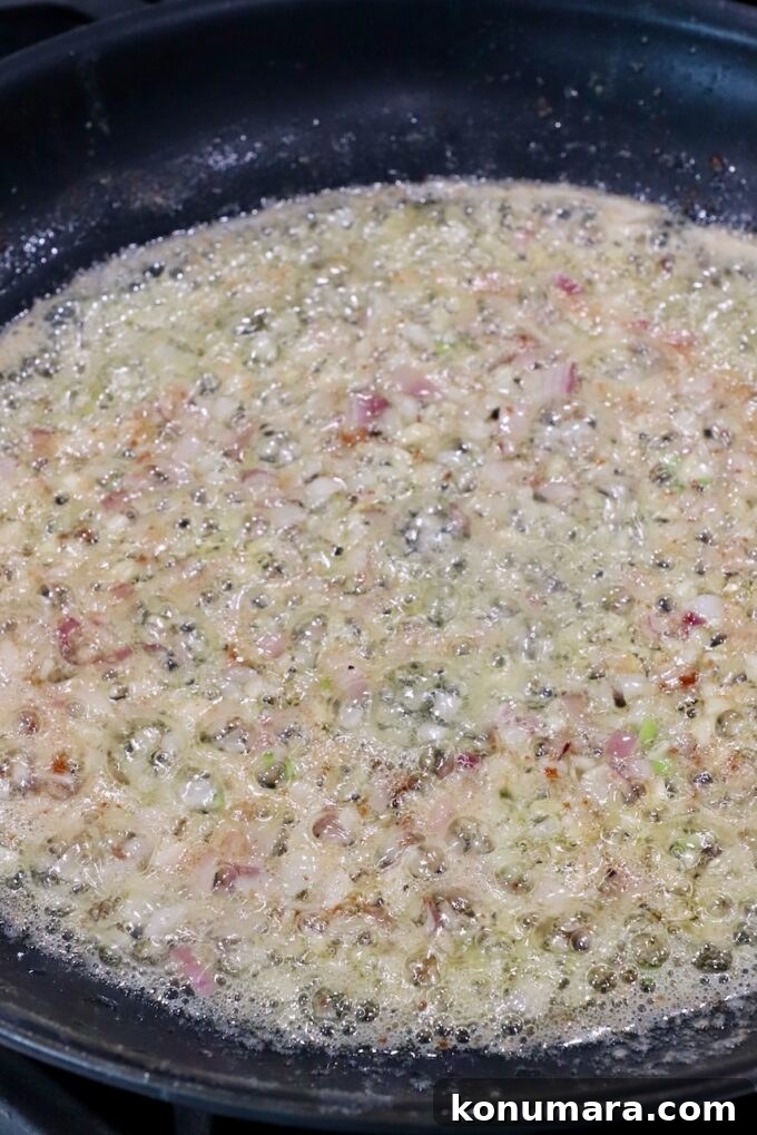 cooked diced shallots and minced garlic in butter in a skillet