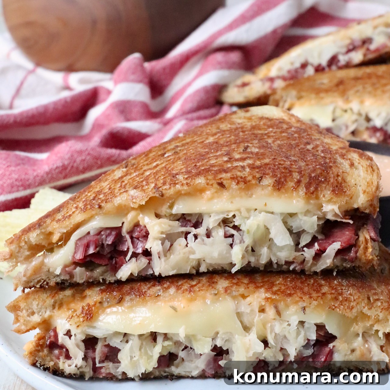 classic Reuben sandwich sliced in half