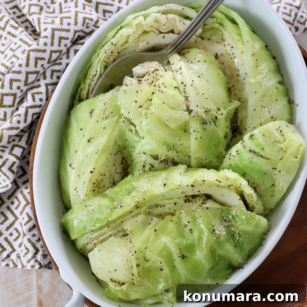 steamed cabbage wedges in serving dish