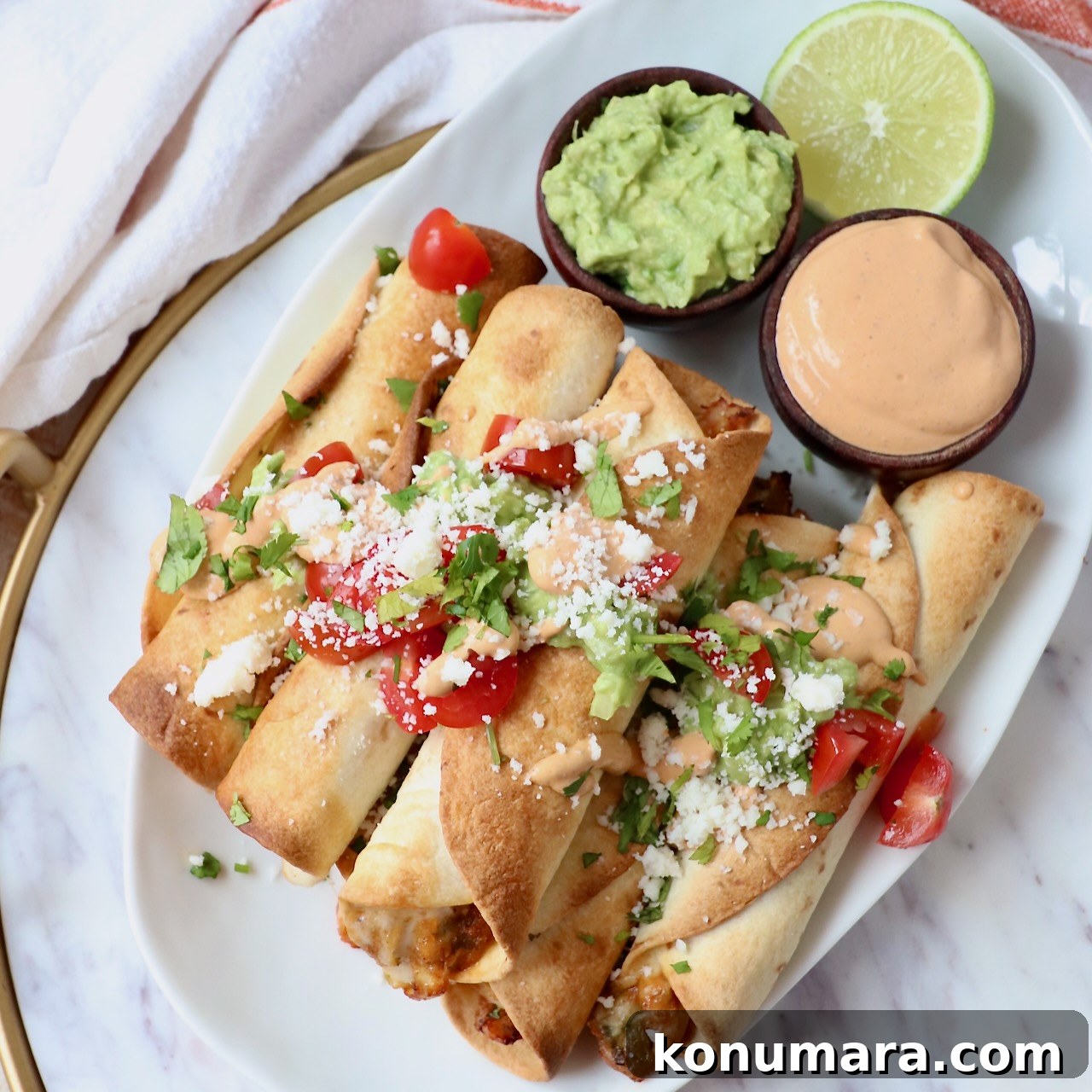 crispy air fryer taquitos with guacamole and chipotle sauce