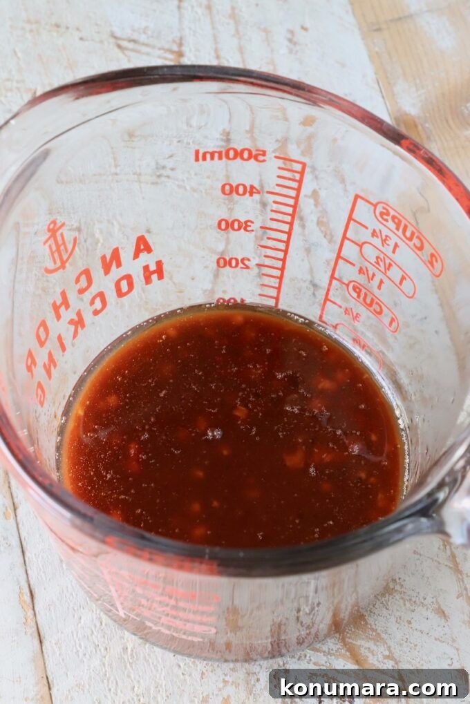 Korean Gochujang Chicken Recipe 4 Gochujang sauce in a glass measuring cup