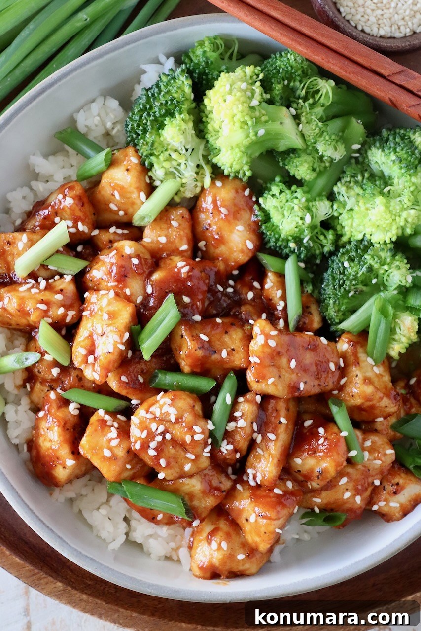 Korean Gochujang Chicken Recipe 9 Gochujang chicken served with rice and steamed broccoli