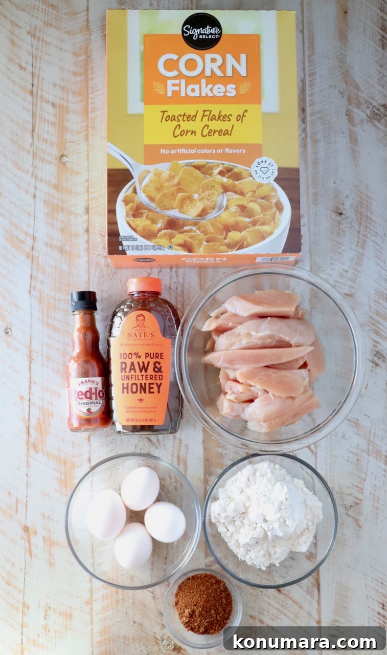 Hot Honey Glazed Chicken Recipe 3 Ingredients for hot honey chicken on a white wood board