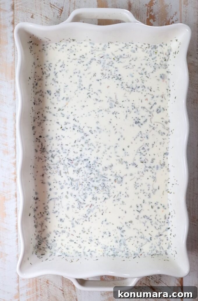 creamy seasoned sauce in a casserole dish