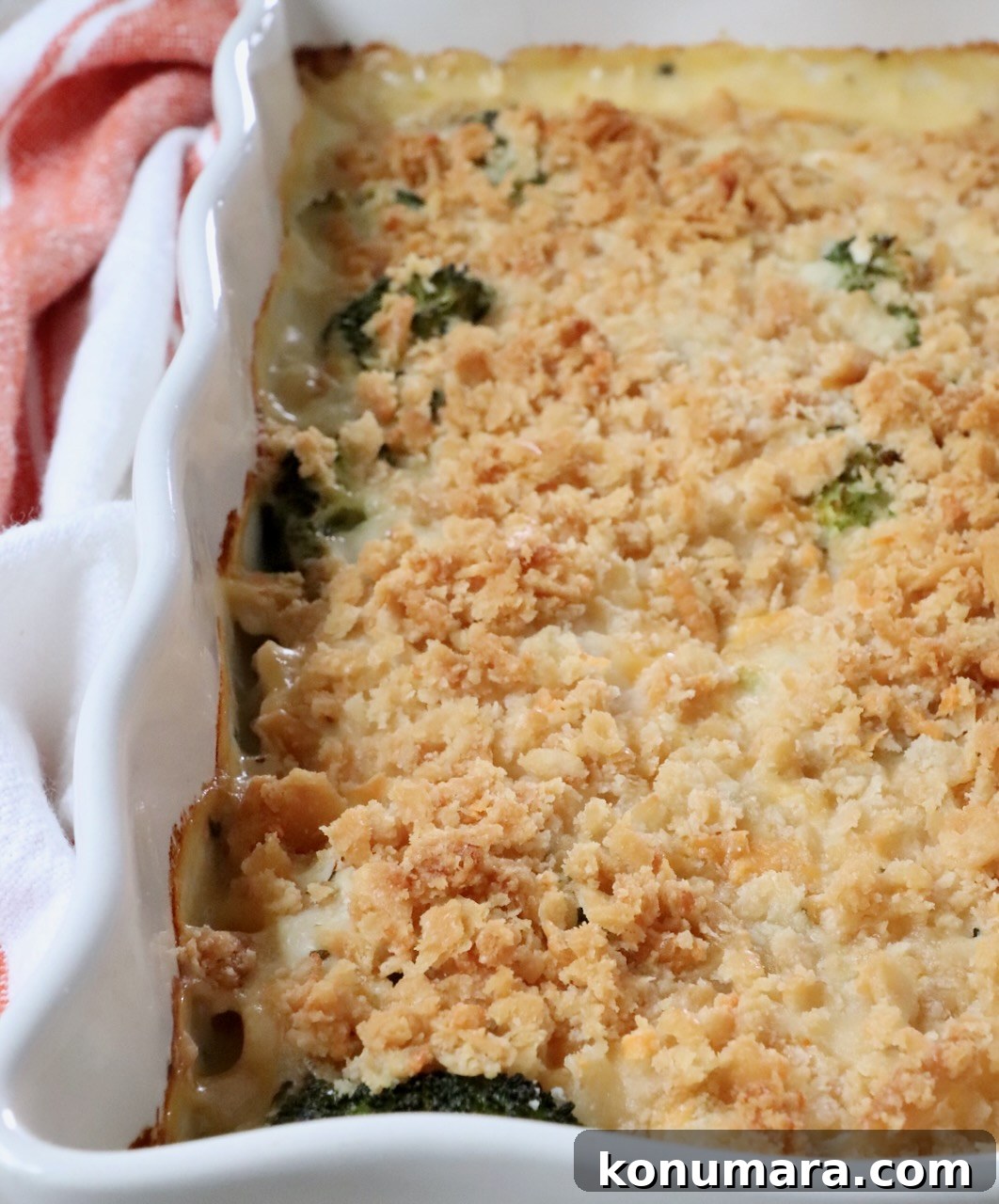 baked casserole with a crunchy cracker topping in a white baking dish