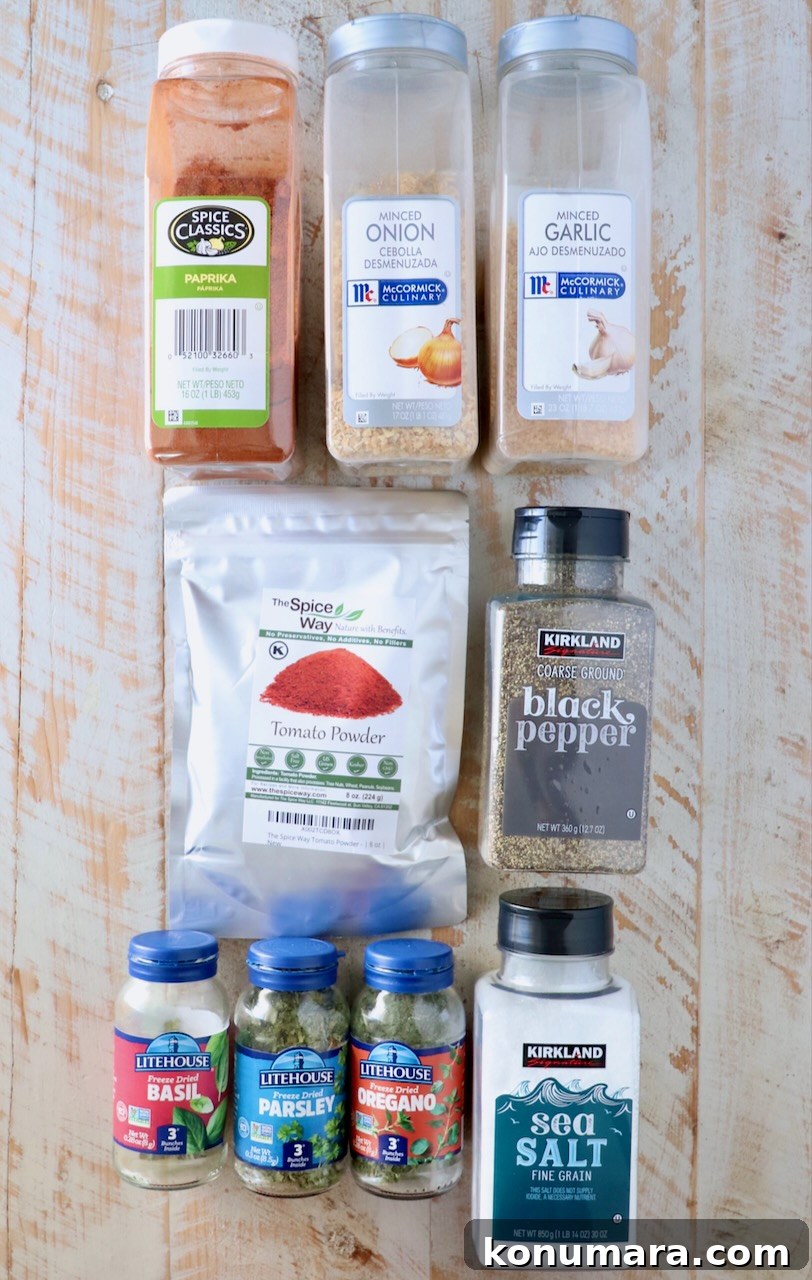 spices in plastic containers on a white wood board