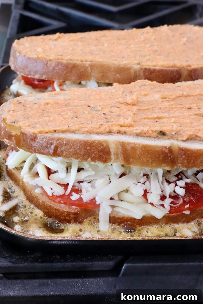 Pepperoni Pizza Grilled Cheese Recipe 8 pizza grilled cheese sandwiches in a skillet