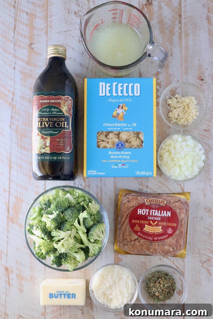 ingredients for orecchiette pasta recipe on a white wood board