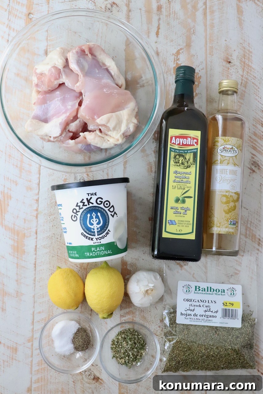 Homemade Greek Chicken Gyros Recipe 3 ingredients for chicken gyro meat on a white wood board