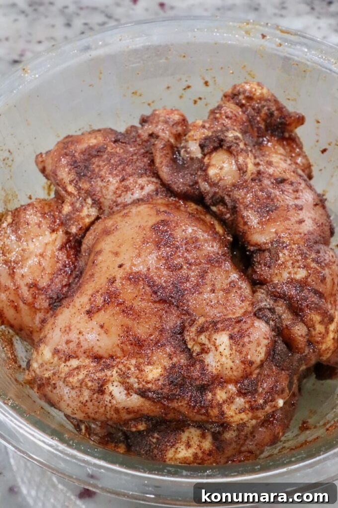 Chipotle Honey Glazed Chicken Recipe 8 Seasoned chicken thighs in a bowl