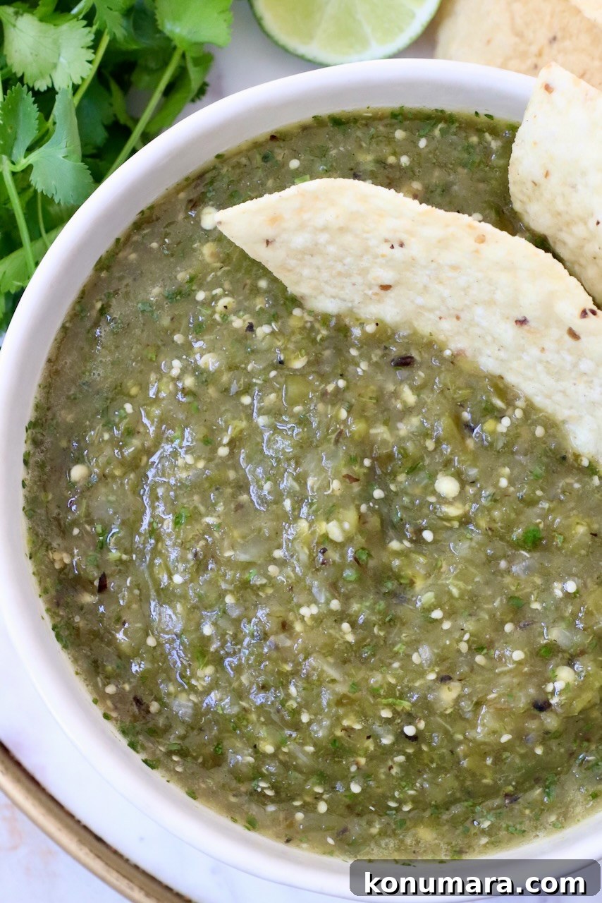 salsa verde in a bowl with tortilla chips