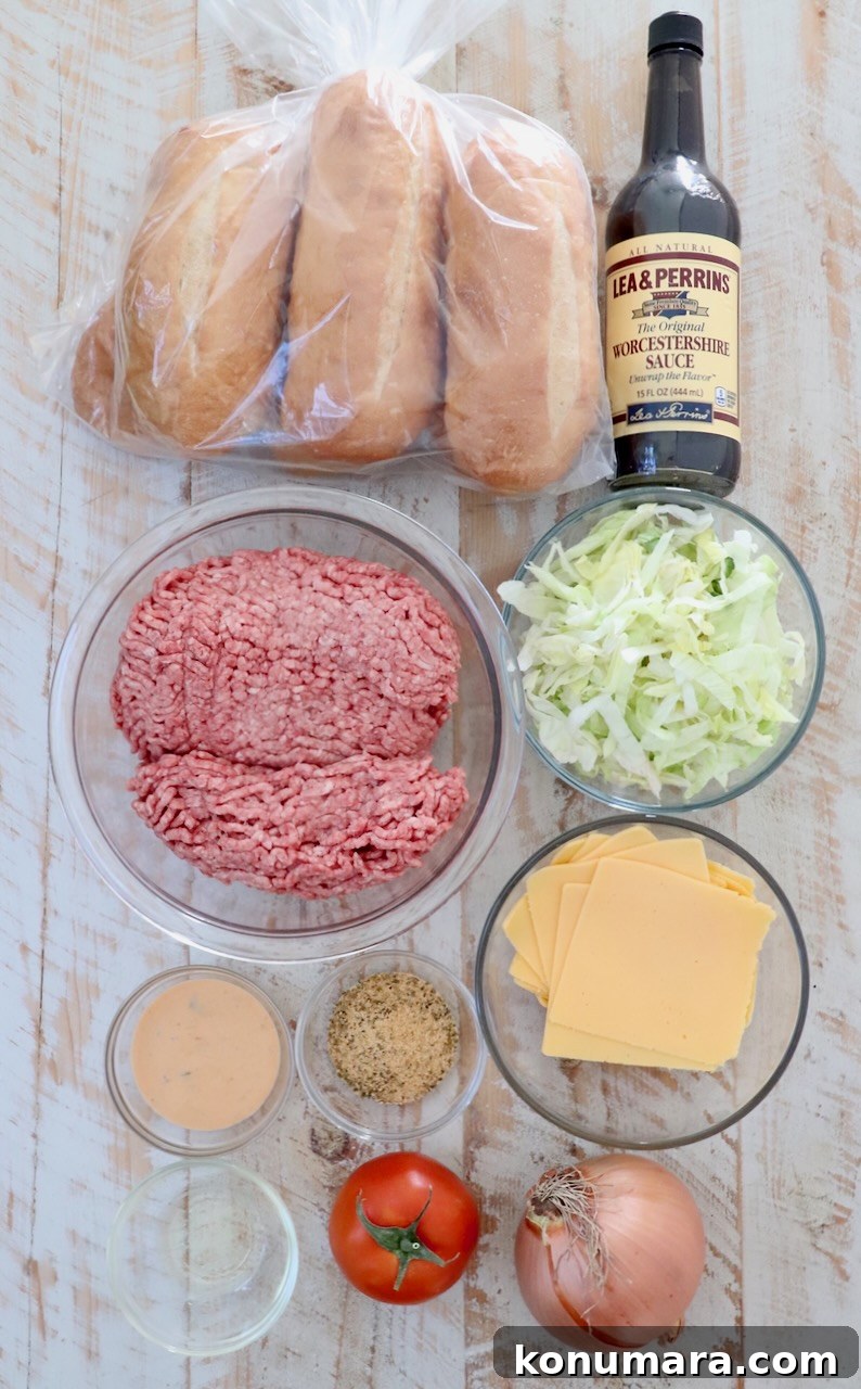 New York Bodega Chopped Cheese Sandwich Recipe 5 ingredients for chopped cheese sandwich on a white wood board