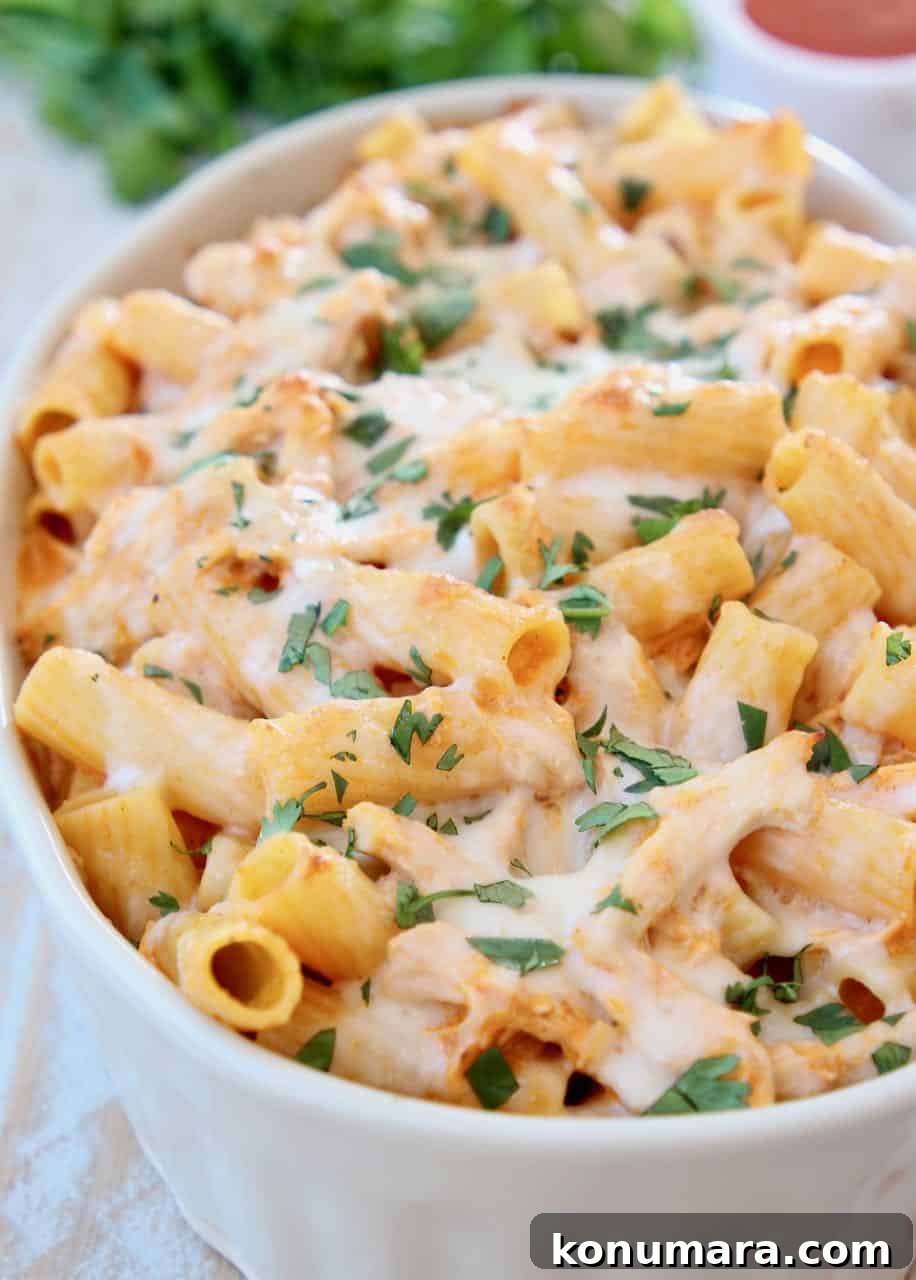 Baked rigatoni with cheese in casserole dish