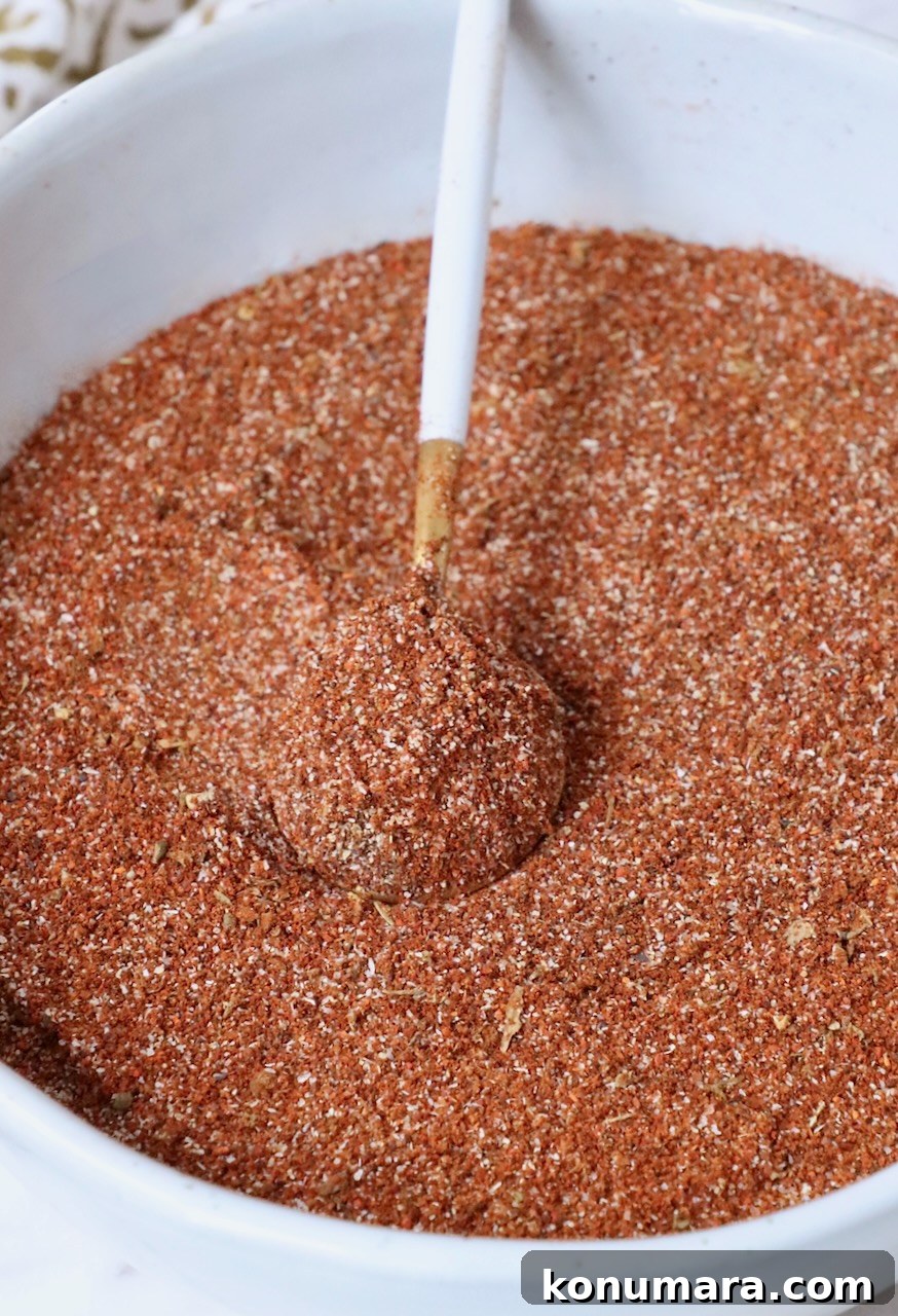 birria seasoning in a bowl with a spoon