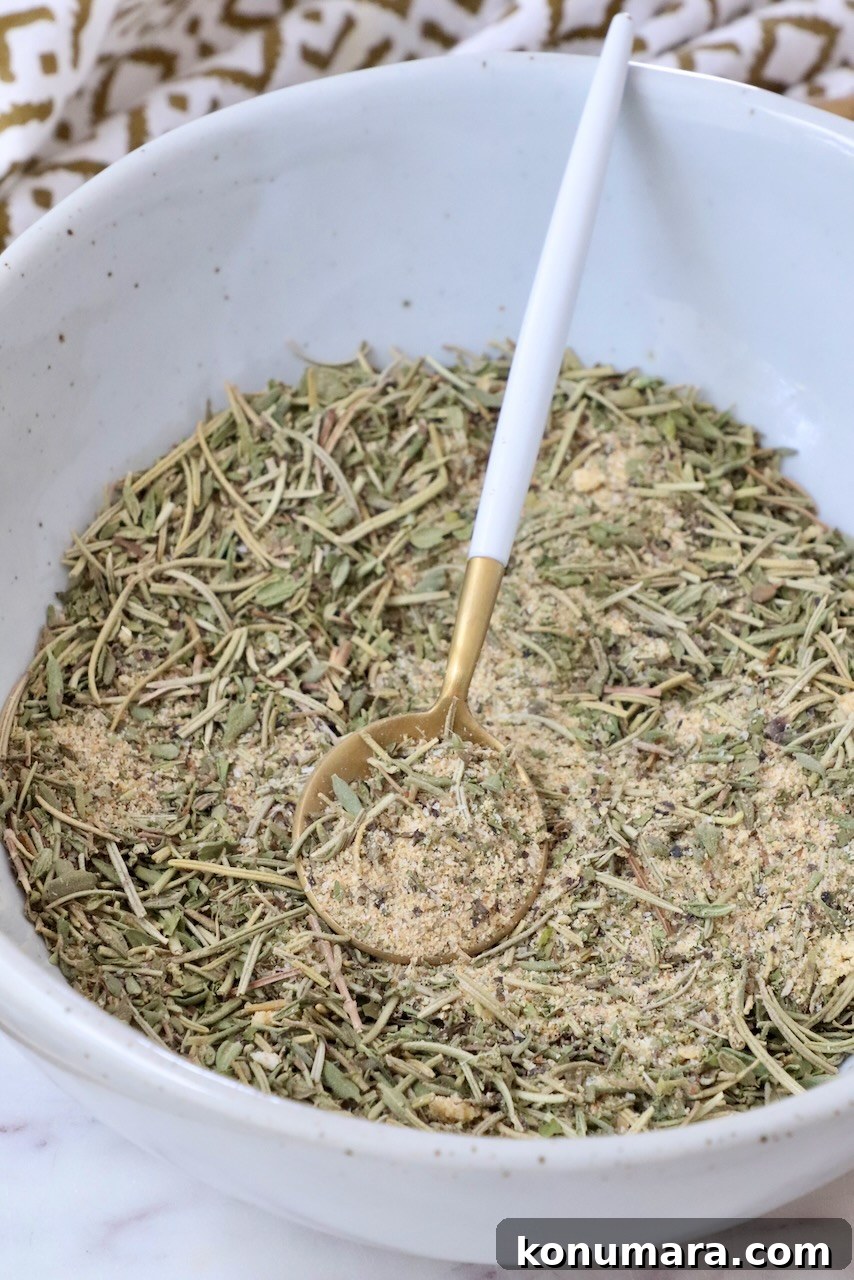 Savory Lamb Seasoning Blend for Roasts and Chops 5 lamb seasoning in a bowl with a spoon