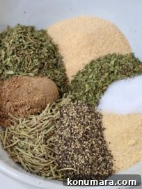 dried herbs and spices separated in a bowl