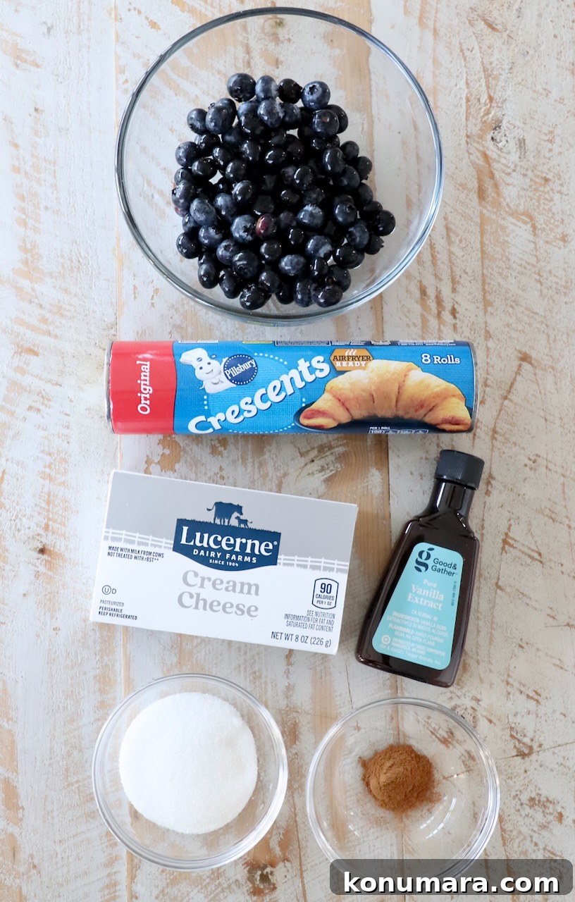 Blueberry Pastry Recipes: Flaky Treats and Baking Tips 3 ingredients for blueberry pastries on white wood board