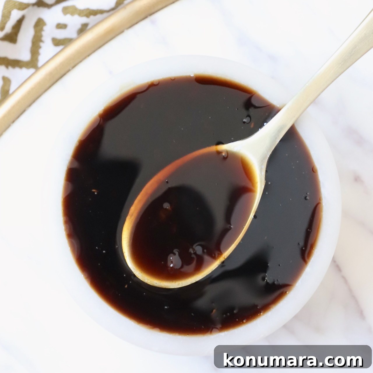 teriyaki sauce in small bowl with spoon