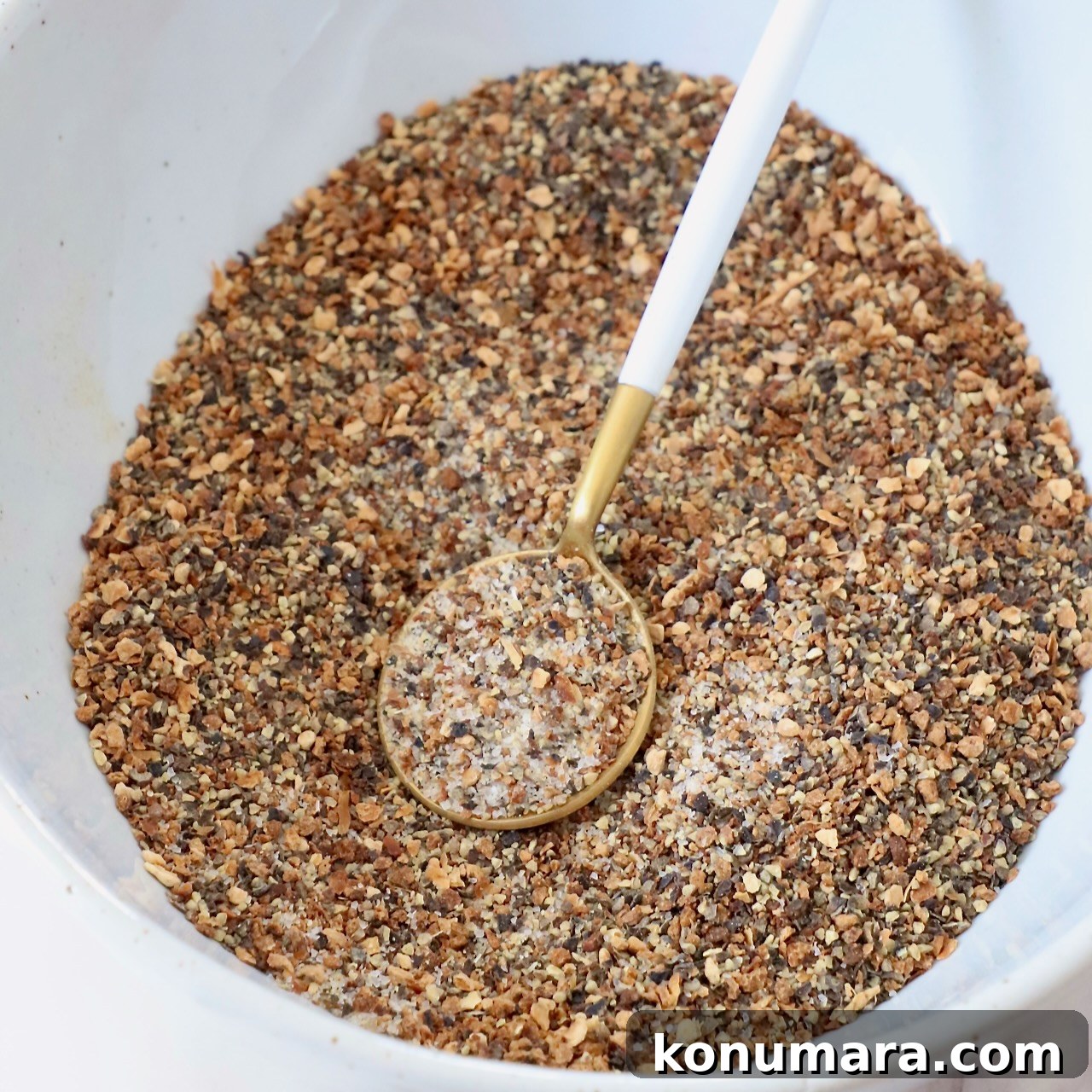 lemon pepper seasoning in bowl with spoon