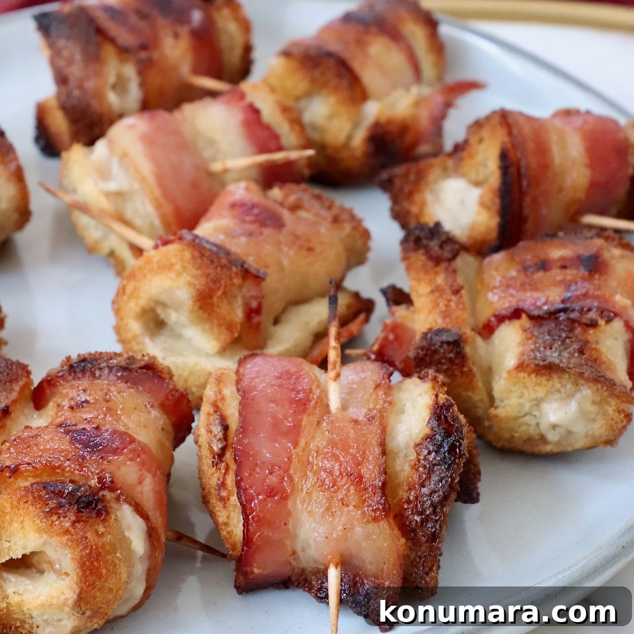 bacon roll ups on a plate