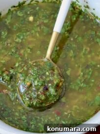 Cilantro chimichurri sauce in a small bowl.