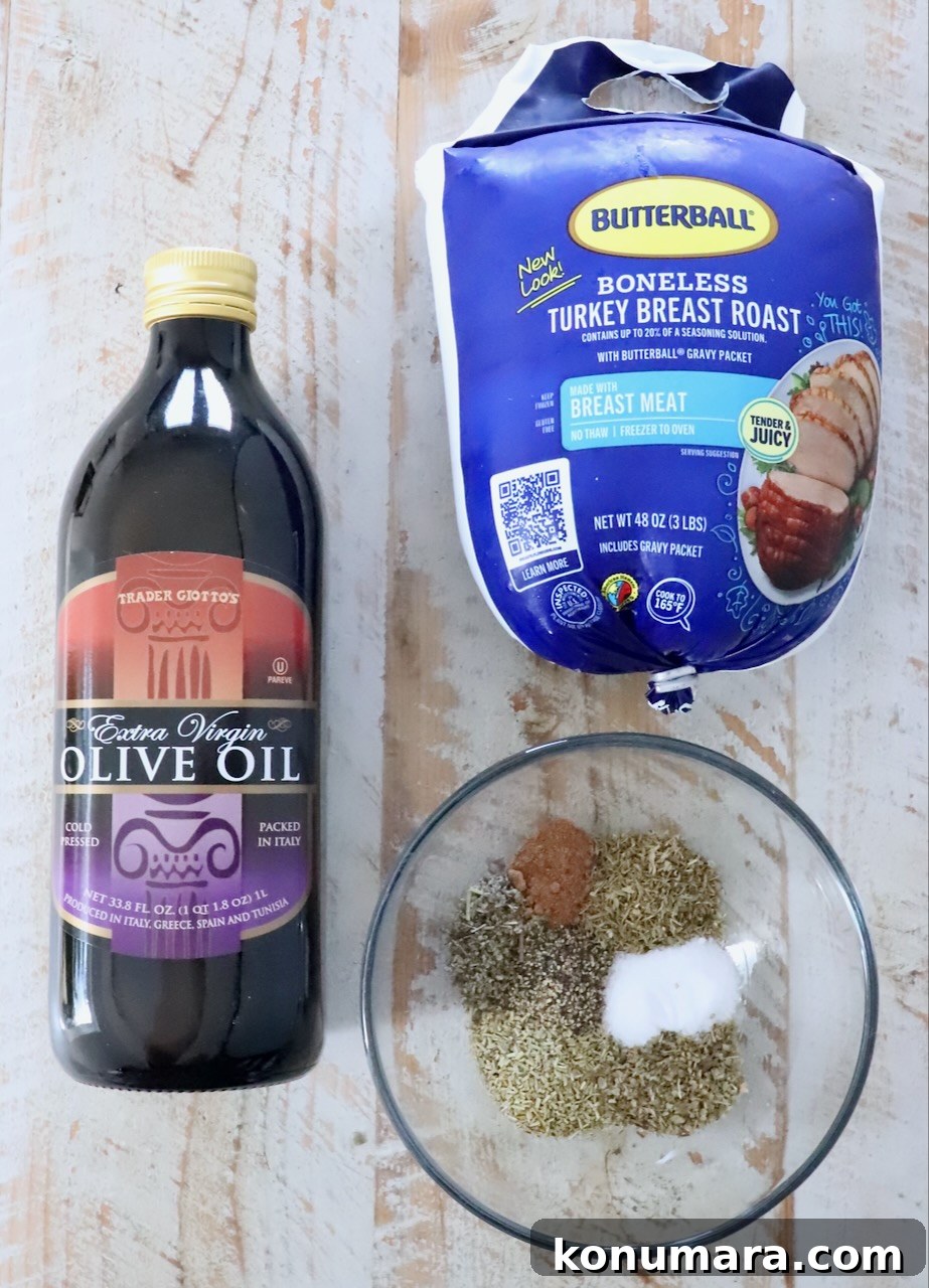 Bottle of olive oil, a package of boneless turkey breast roast, and a glass bowl with mixed spices on a light wooden surface.