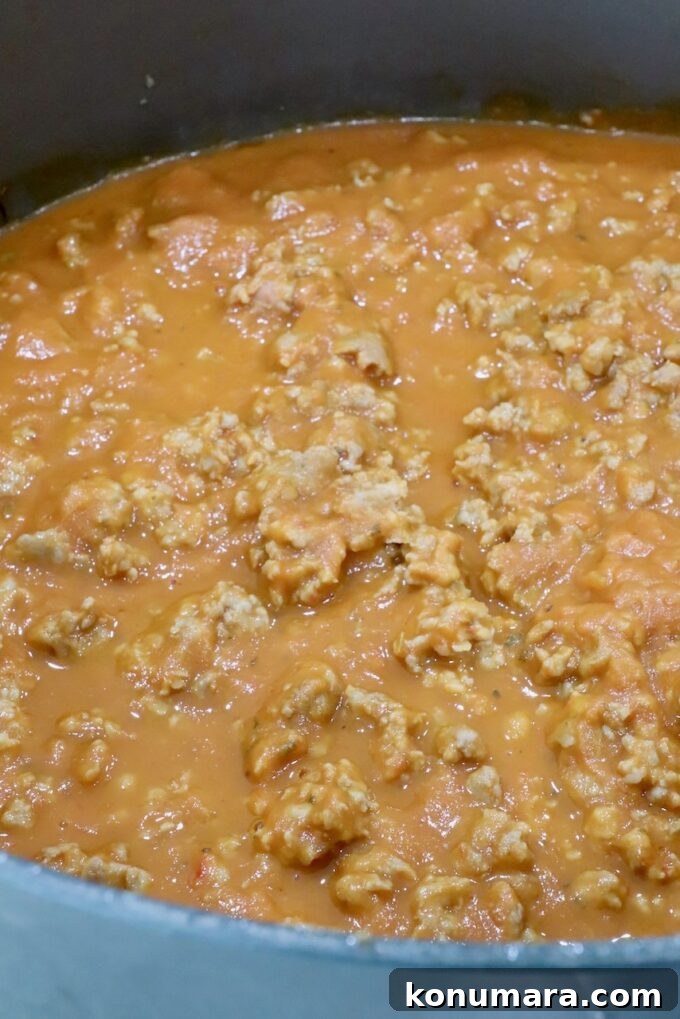Baked Butternut Squash Ravioli with Brown Butter and Sage 5 cooked, crumbled sausage in butternut squash sauce in a large pot