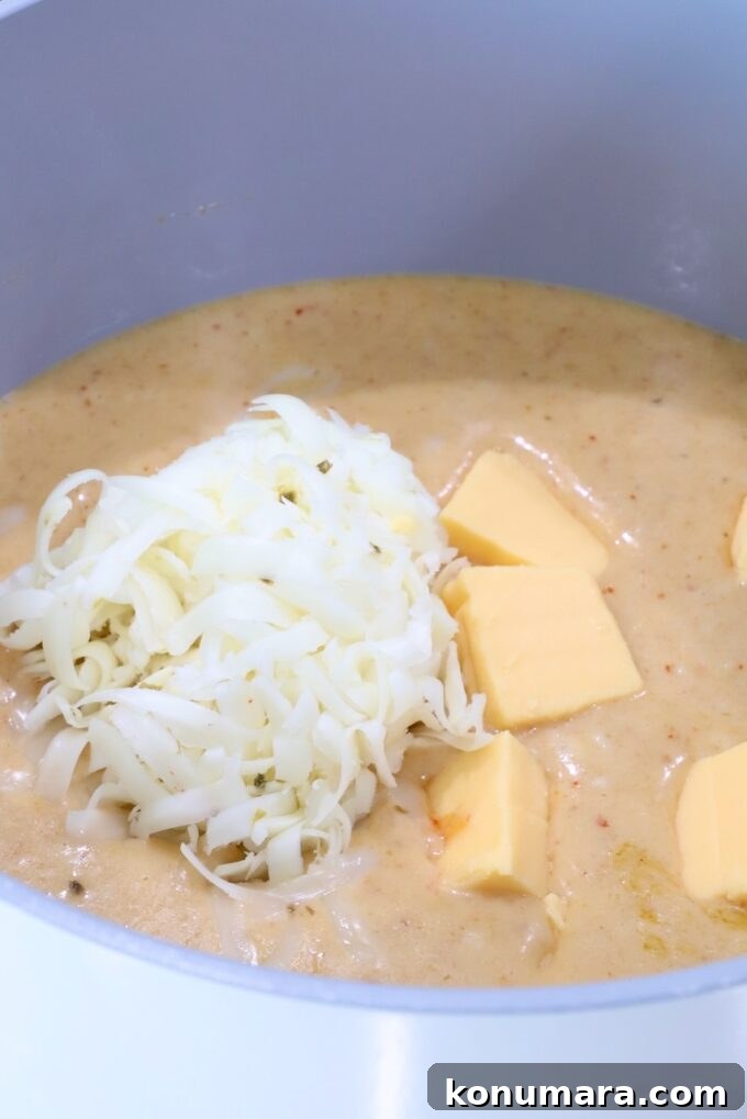 Curry Queso Dip Recipe 6 creamy red curry sauce with Velveeta and shredded pepper jack