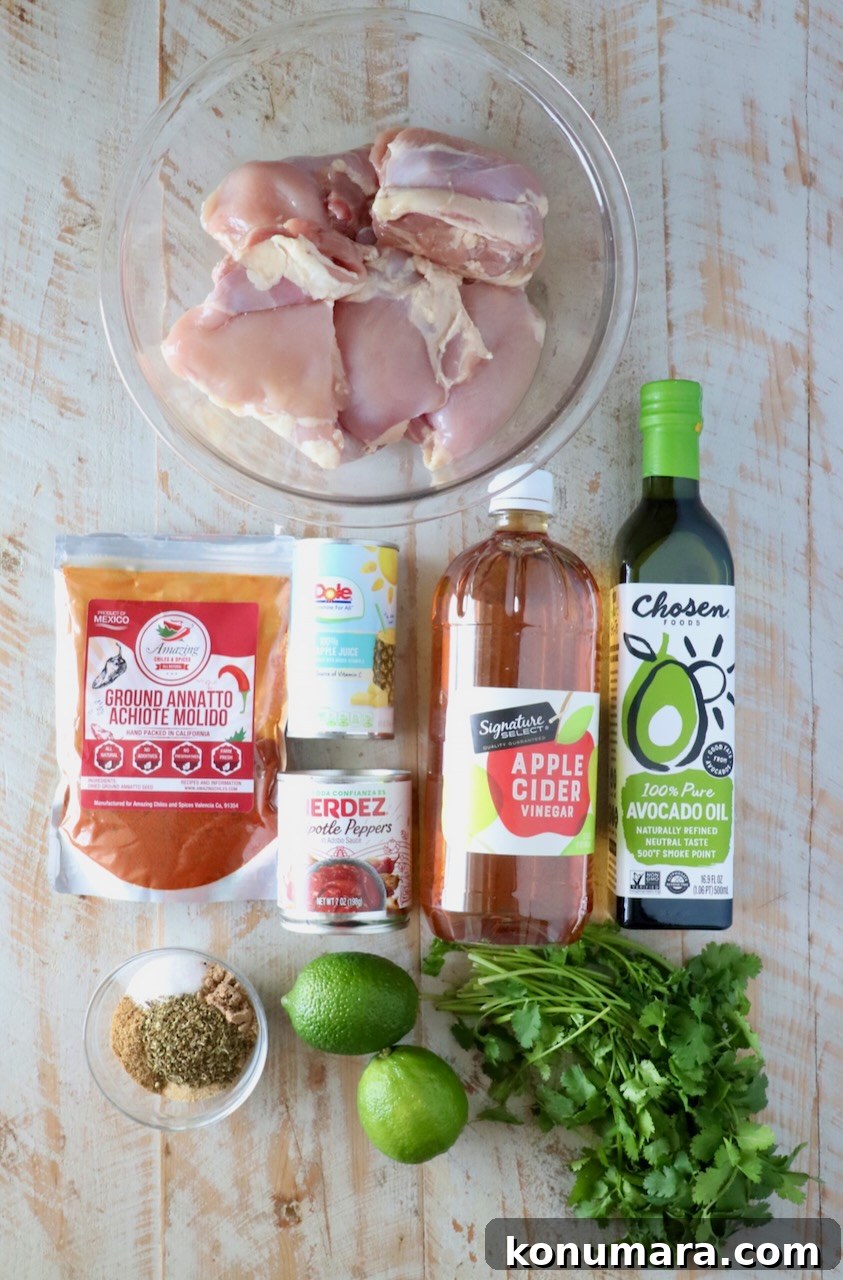 How to Make Chicken Al Pastor Tacos with Pineapple 3 Raw chicken thighs in a bowl surrounded by ground annatto, pineapple juice, chipotle peppers, apple cider vinegar, avocado oil, lime, cilantro, and spices.