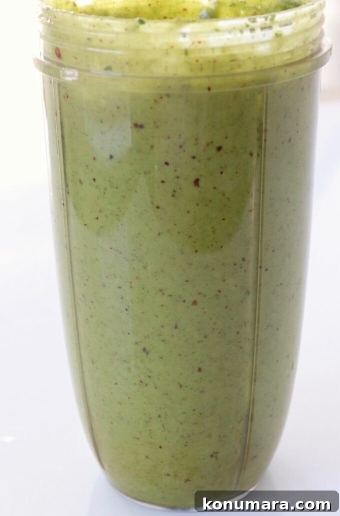 Spicy cashew dressing in a blender cup