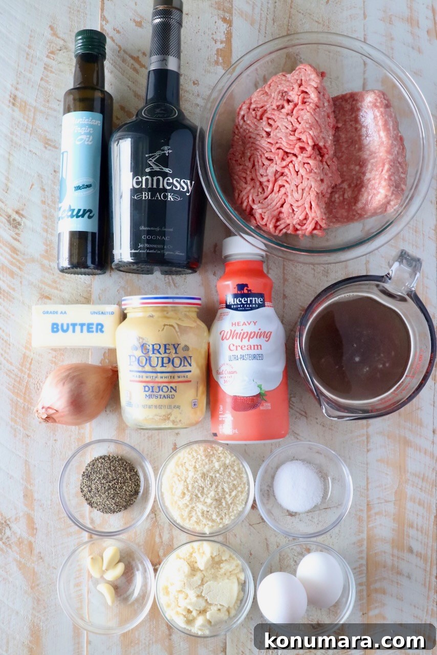 Ingredients for a recipe displayed on a wooden surface include olive oil, Hennessy, ground meat, cream, broth, butter, mustard, eggs, spices, and garlic.