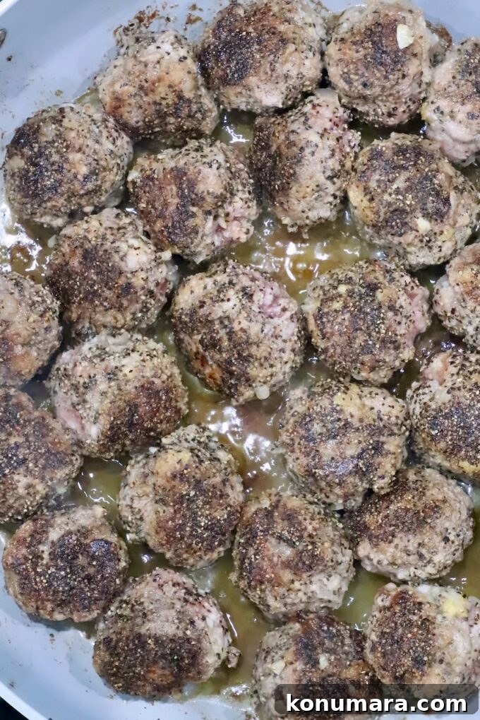 cooked meatballs in a skillet