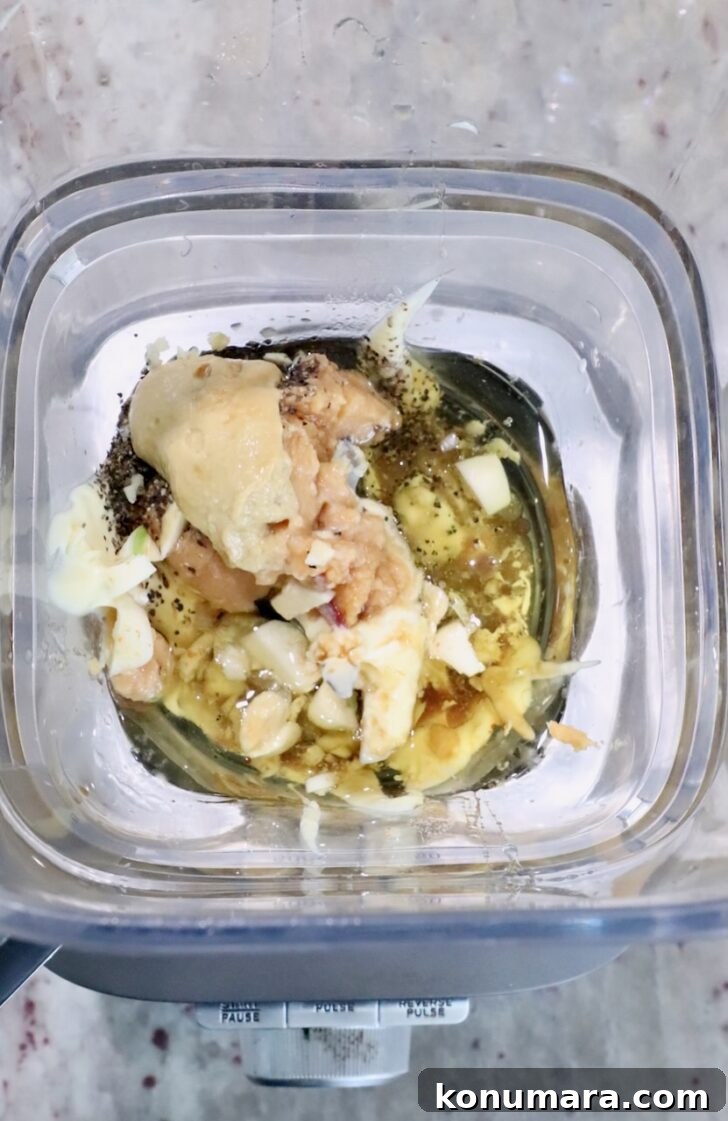 mayonnaise, miso paste, garlic, and oil in a blender