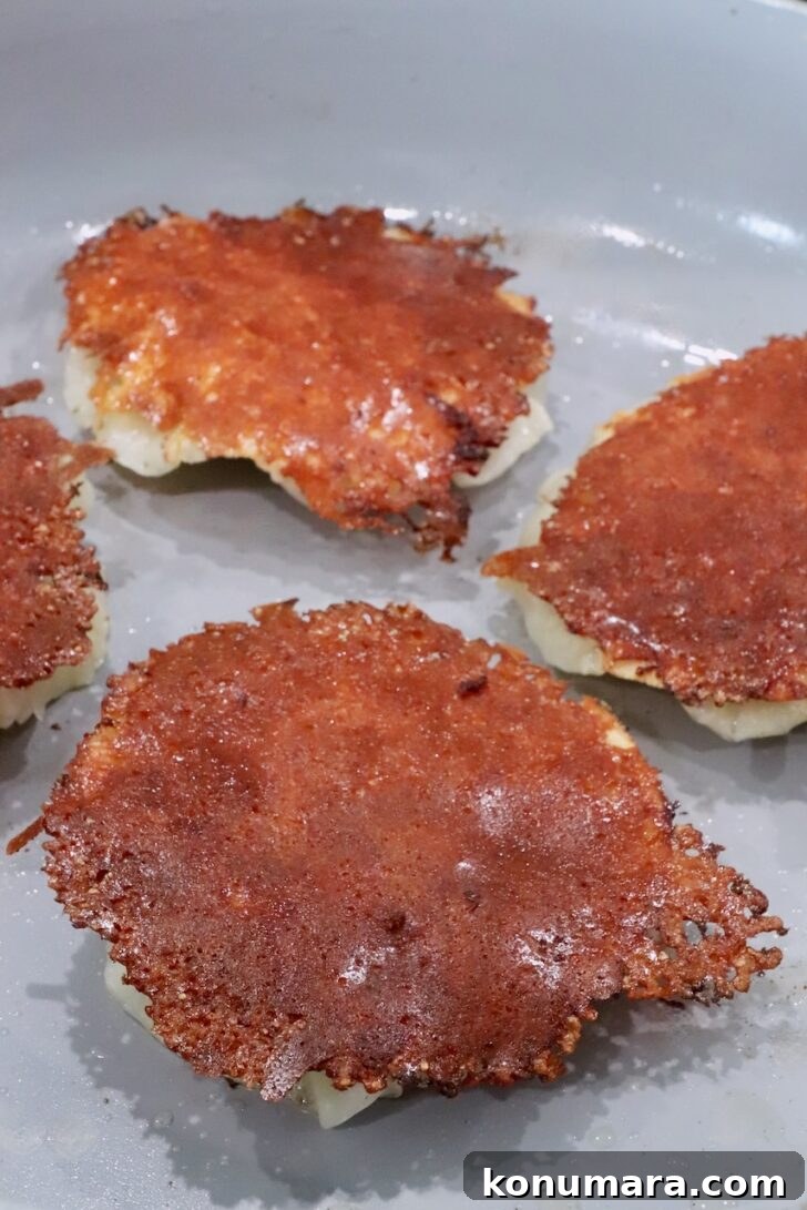 mozzarella cheese crusted raviolis in a skillet