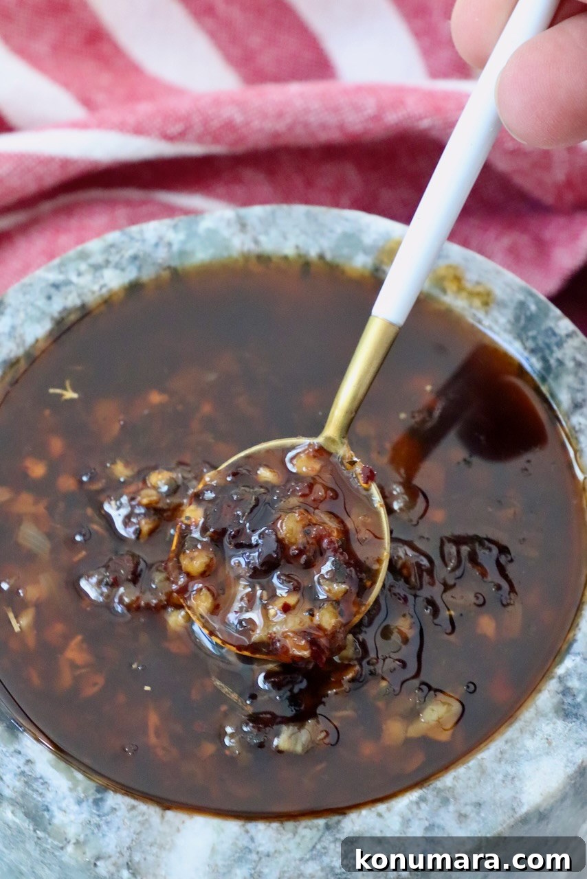 Calabrian chili crisp in a bowl with a spoon