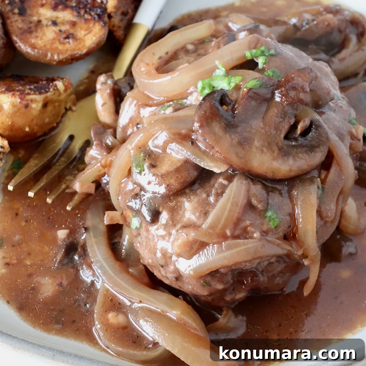 Chopped steak with onions, mushrooms, and gravy