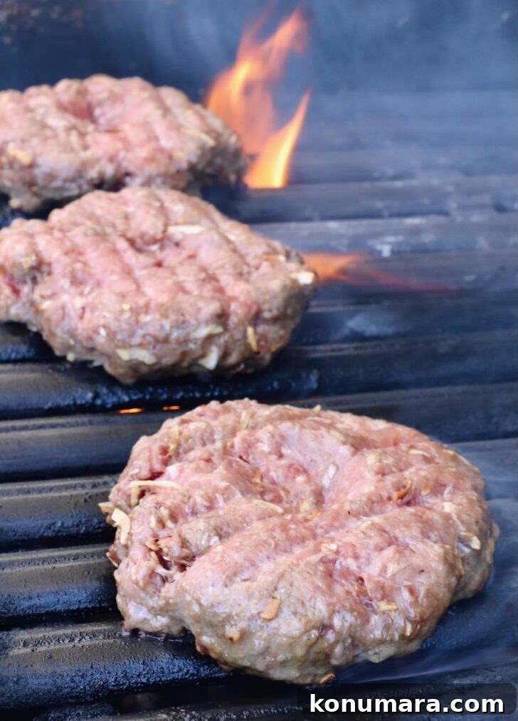 burger patties on a grill
